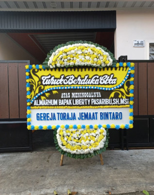 Papan Bunga Duka di Boting